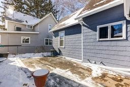 view of snow covered house