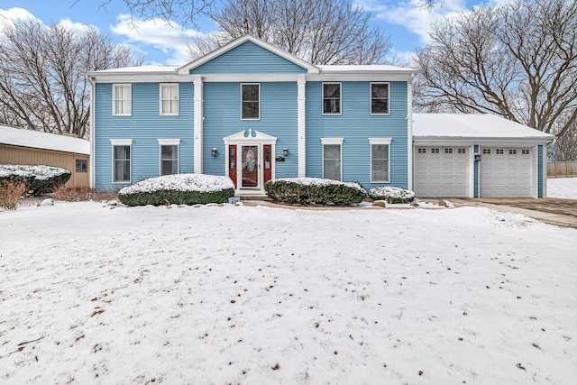 view of front of home with a garage