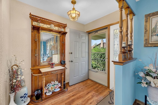 foyer with light wood-type flooring