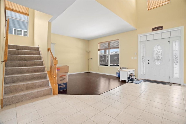 foyer with light tile patterned flooring