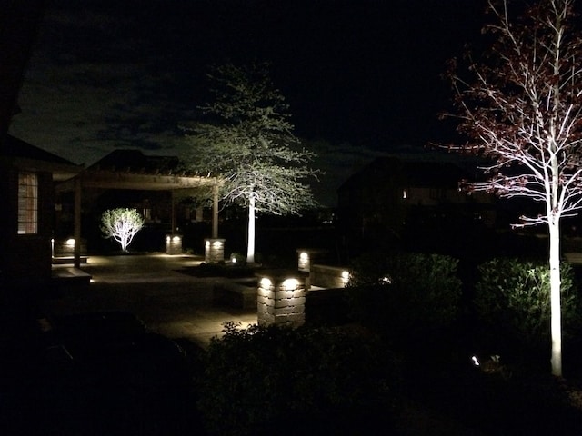 view of yard at night