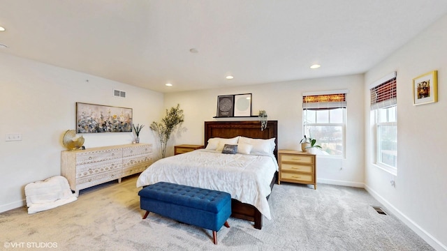 bedroom featuring visible vents, baseboards, recessed lighting, and carpet