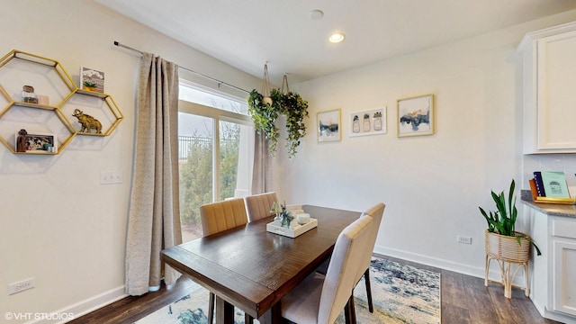 dining area featuring dark wood-style flooring, baseboards, and recessed lighting