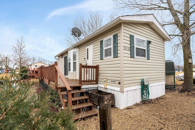 view of front of house with a deck