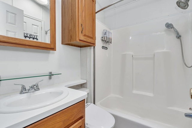 full bath with tub / shower combination, vanity, and toilet