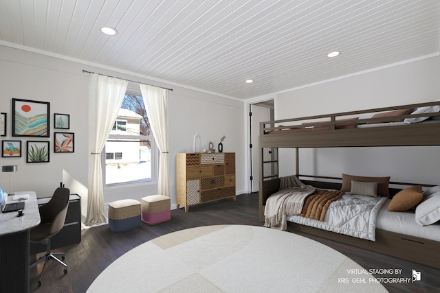 bedroom featuring crown molding and dark wood-type flooring