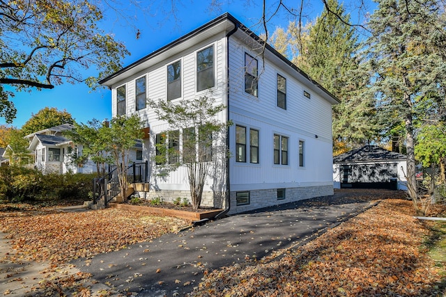 view of home's exterior featuring a garage