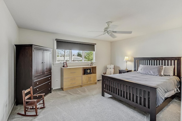 627 68th St, Willowbrook, IL 60527 - bedroom featuring baseboards, light carpet, and ceiling fan