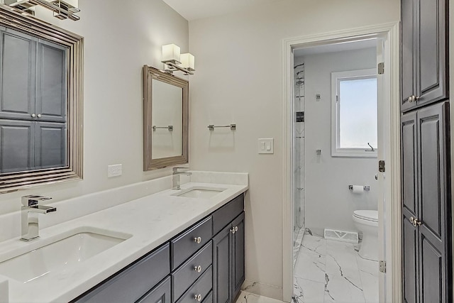 627 68th St, Willowbrook, IL 60527 - bathroom featuring visible vents, marble finish floor, toilet, and a sink