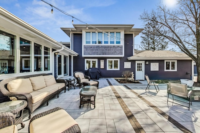627 68th St, Willowbrook, IL 60527 - rear view of house featuring outdoor lounge area and a patio