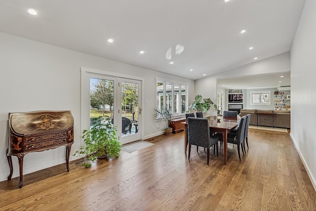 627 68th St, Willowbrook, IL 60527 - dining area with vaulted ceiling, recessed lighting, baseboards, and wood finished floors