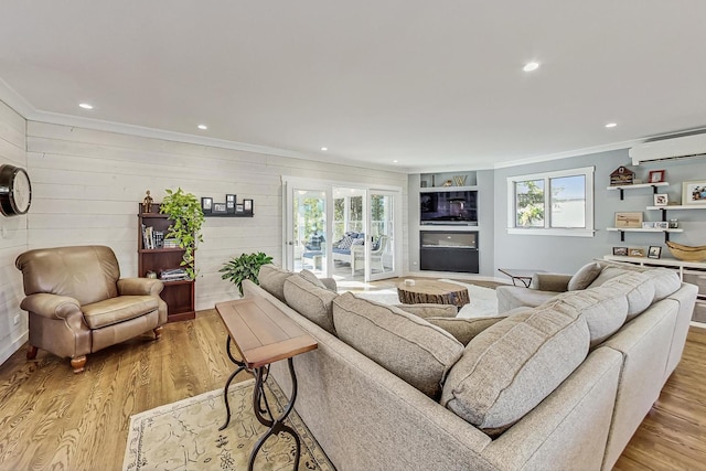 627 68th St, Willowbrook, IL 60527 - living room with a wall mounted air conditioner, recessed lighting, crown molding, and light wood finished floors