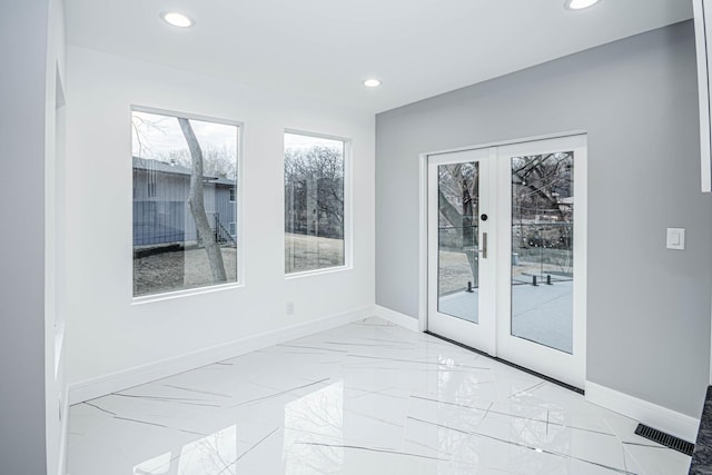 doorway to outside featuring french doors