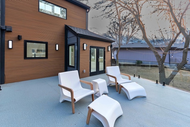 view of patio featuring french doors