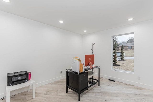 office area featuring light hardwood / wood-style flooring