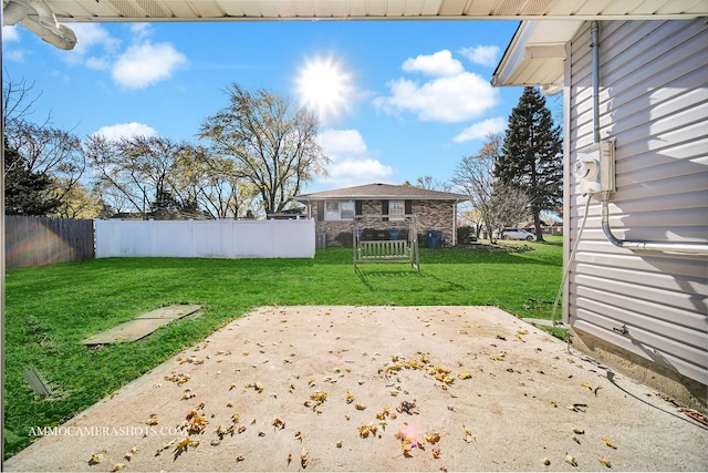 view of yard featuring a fenced backyard and a patio