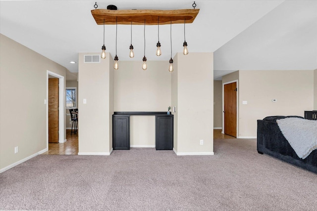 interior space with visible vents and baseboards