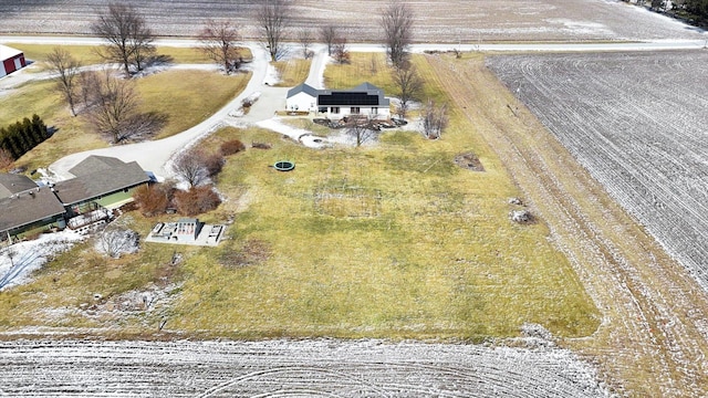 birds eye view of property with a rural view