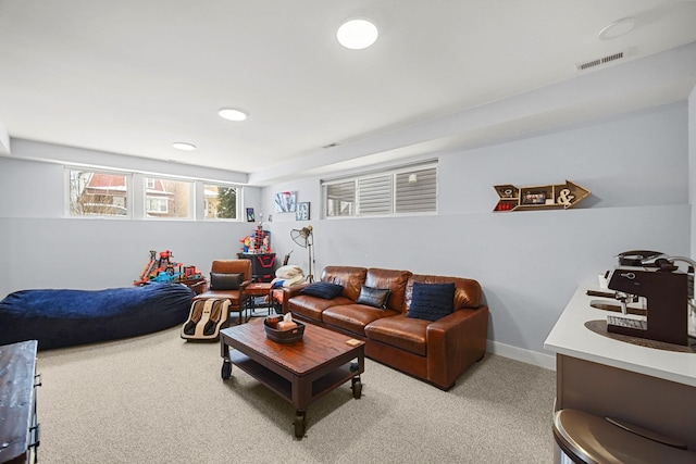 living area featuring recessed lighting, light carpet, visible vents, and baseboards