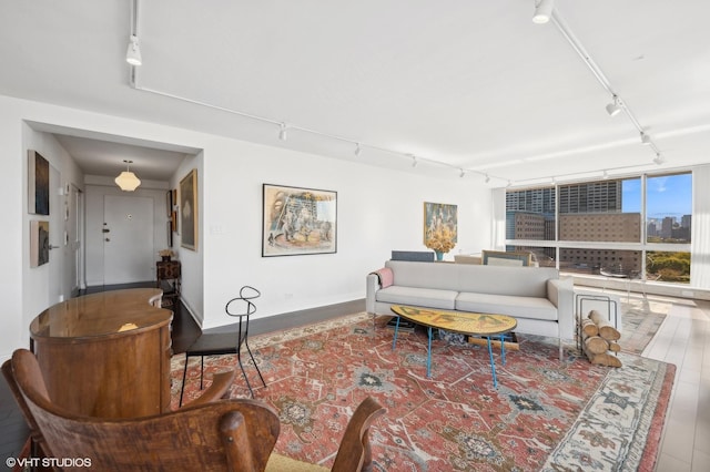 living room featuring rail lighting