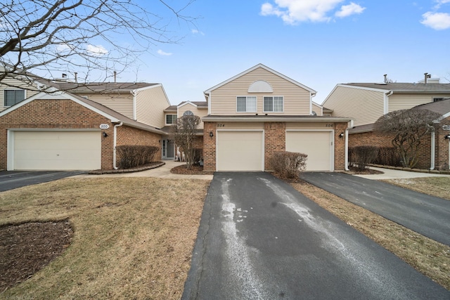 view of property featuring a front lawn