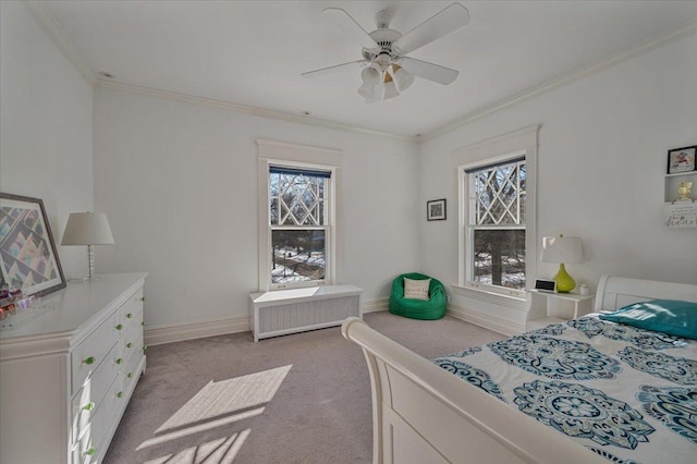 bedroom featuring carpet floors, multiple windows, and crown molding