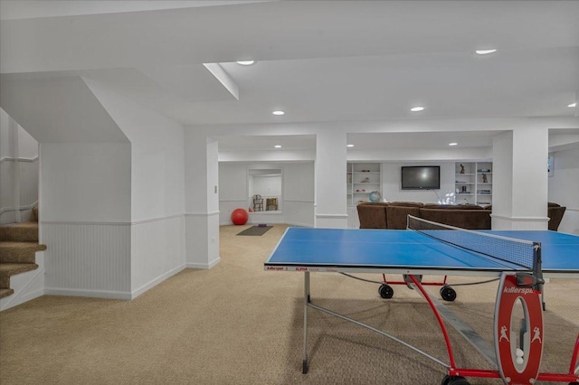 playroom featuring recessed lighting, carpet floors, baseboards, built in features, and wainscoting