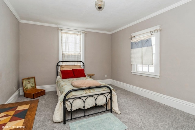 bedroom with baseboards, carpet floors, and ornamental molding