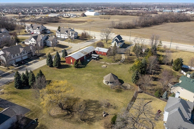 birds eye view of property with a residential view