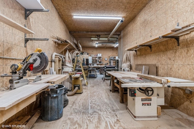 misc room with a workshop area