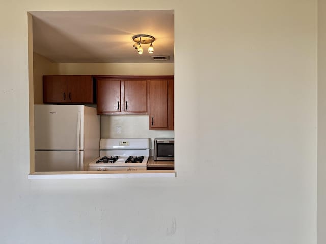 kitchen with white appliances