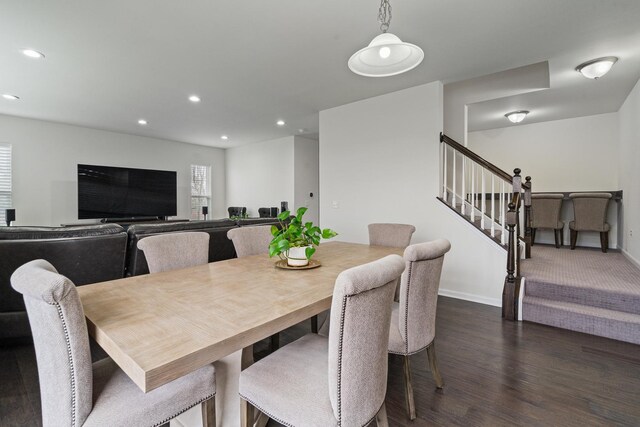 dining space featuring recessed lighting, stairs, baseboards, and dark wood-style floors