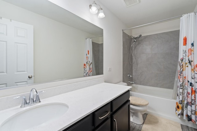 full bath featuring visible vents, shower / bath combo, toilet, and vanity