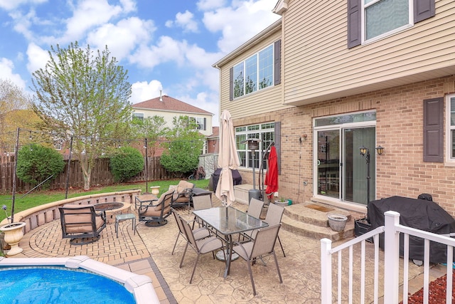 1898 Barrington Ave, Bolingbrook, IL 60490 - view of swimming pool with a fire pit, entry steps, a patio area, a fenced backyard, and a grill