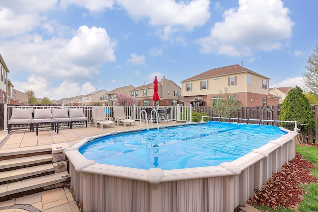 1898 Barrington Ave, Bolingbrook, IL 60490 - view of swimming pool featuring fence, a patio, an outdoor hangout area, and a residential view