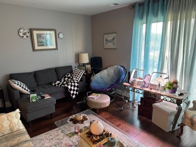 living room featuring dark hardwood / wood-style floors