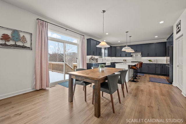 dining area featuring light hardwood / wood-style floors