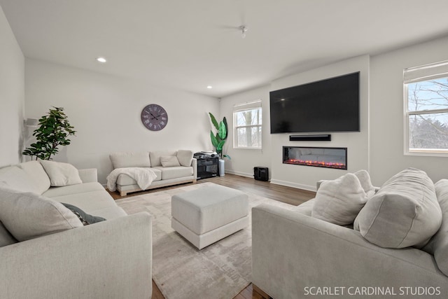 living room with light hardwood / wood-style floors