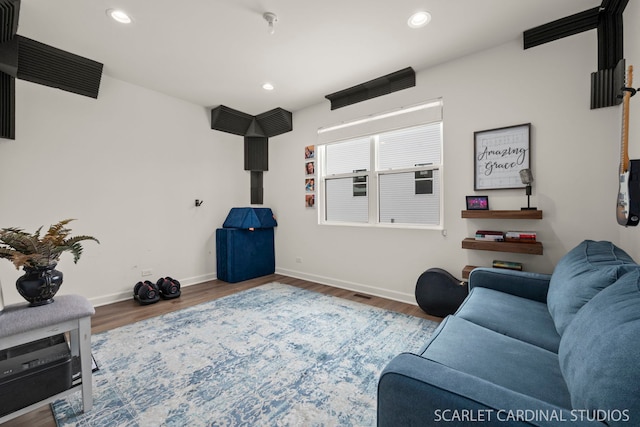 home theater with hardwood / wood-style flooring