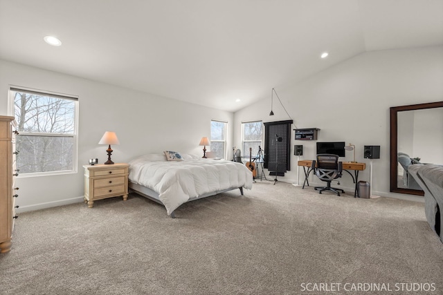 bedroom featuring lofted ceiling and light colored carpet