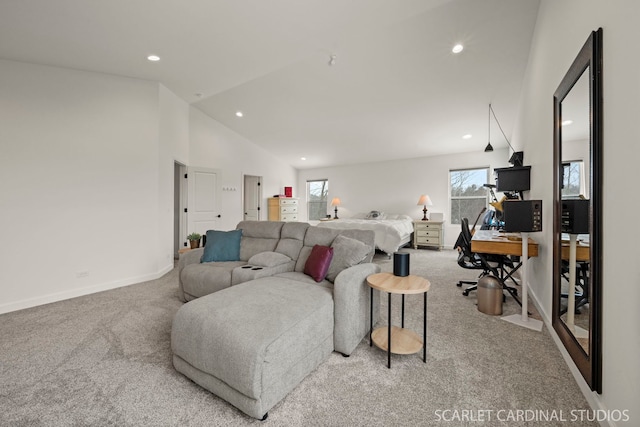 living room with high vaulted ceiling and carpet