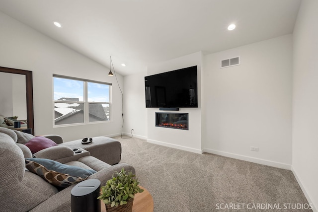 living room with vaulted ceiling and carpet