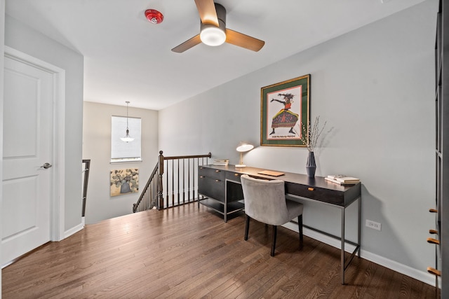 home office with hardwood / wood-style flooring and ceiling fan