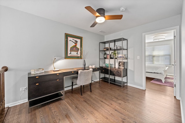 office space featuring wood-type flooring and ceiling fan