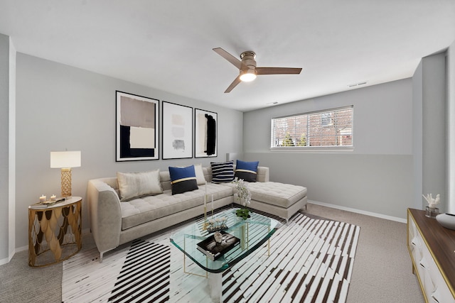 living room featuring ceiling fan