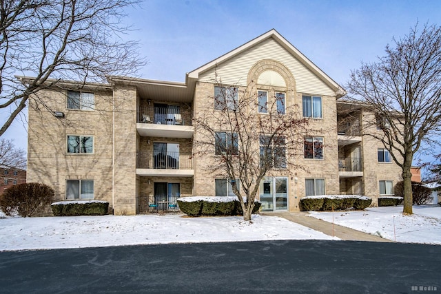 view of snow covered property