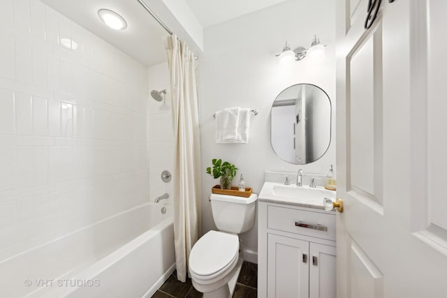 full bathroom with toilet, vanity, and shower / tub combo