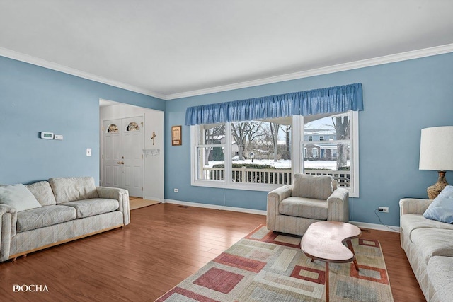 living room featuring ornamental molding and hardwood / wood-style flooring