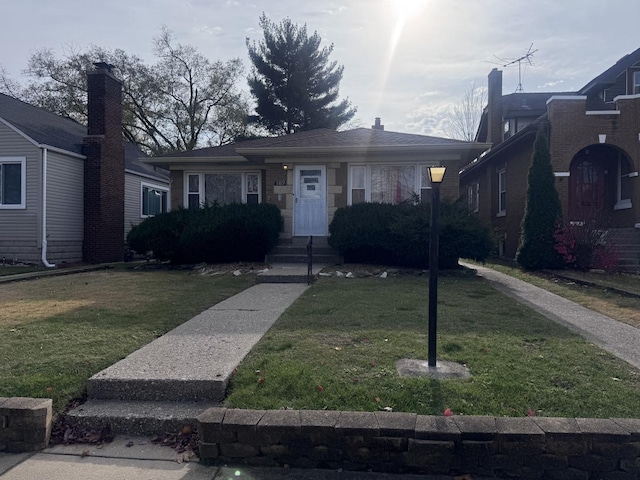 view of front of home with a front yard