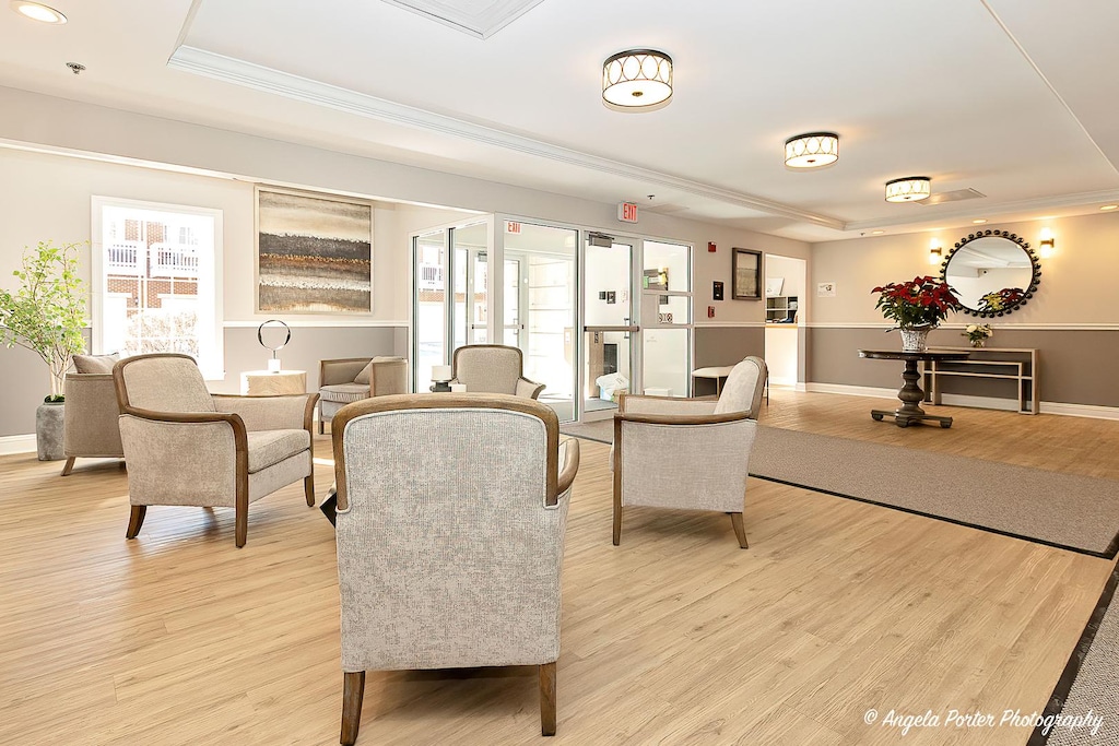 community lobby with crown molding and recessed lighting